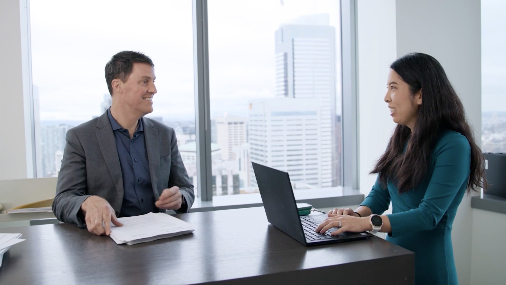 People speaking in an office.
